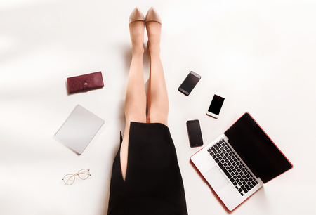 Fashion blogger writing on laptop computerの写真素材