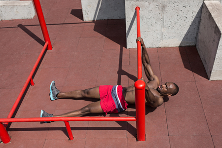 Athlete doing exercises at stadium