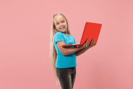 Teen girl with laptop. Love to computer concept. Attractive female half-length front portrait,...