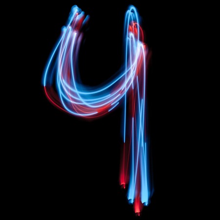The neon number 4, blue light image, long exposure with colored fairy lights, against a black...