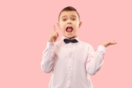 Do not miss. Young casual boy shouting. Shout. Crying emotional teen screaming on pink studio...