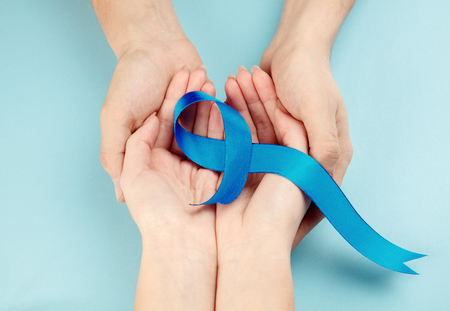 Blue ribbon symbolic of prostate cancer awareness campaign and mens health in November. The cancer, health, breast, awareness, campaign, disease, help, care, support, hope, illness, survivor healthcare conceptの写真素材