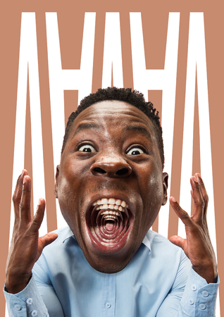 Wow. Contemporary modern art collage about young african emotional surprised man with open mouth. Human emotions, facial expression concept. cry from the heartの写真素材