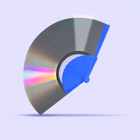 Concept of alternative sound, new wind trends. A music disc as a hand fan on trendy purple...