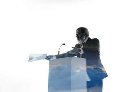 Proof. Speaker, coach or chairman during politician speech isolated on white background. Double exposure - truth and lies. Business training, speaking, promises, economical and financial relations.の写真素材