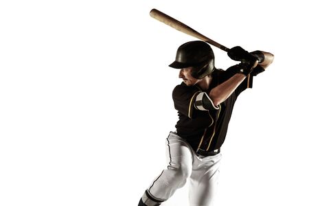 Baseball player, pitcher in a black uniform practicing and training isolated on a white background....