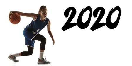 Young caucasian female basketball player of team in action, motion in run.