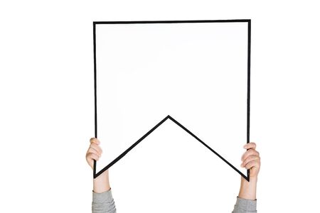Hands holding the sign of bookmark on white studio