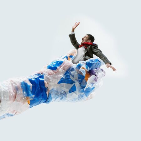Concept of ecology disaster, environmental pollution, garbage. Stop plastic. Negative space to...