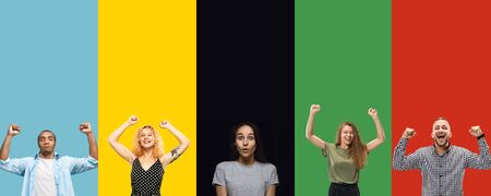 Portrait of group of young people isolated on multicolored studio background, flyer, collage....