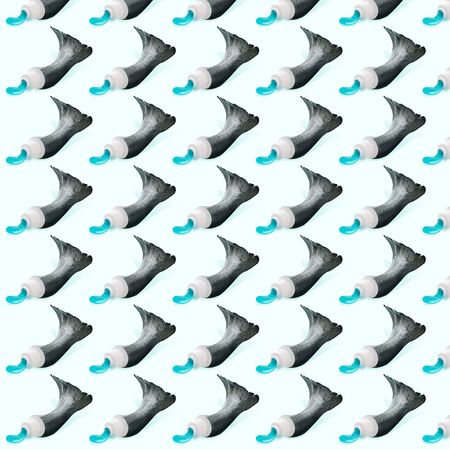 Modern colorful pattern made of exclusive design of a tooth paste as a fish, modern background. Alternative view, new look, conceptual inspiring wallpaper for your advertising. Creative art.の写真素材