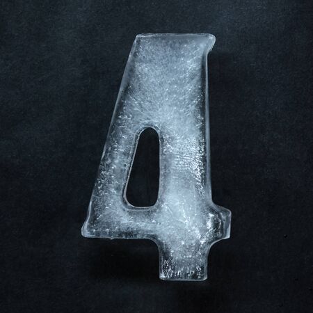 Melting. Numeric value, numbers made out of shiny and well-structured ice isolated on dark studio...
