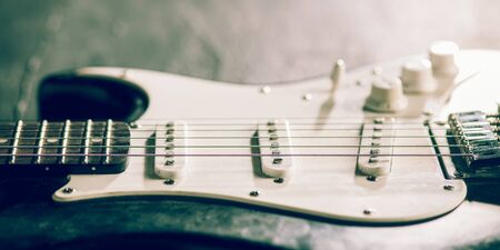 Sound. Professional guitar. Close up of old retro things shooted with vintage style colors and...