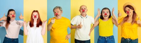 Collage of happy young people as a clowns celebrating red nose day. Male and female models on bicolored blue-yellow studio background. Celebrating, greeting, holidays concept. Human facial emotions.の写真素材