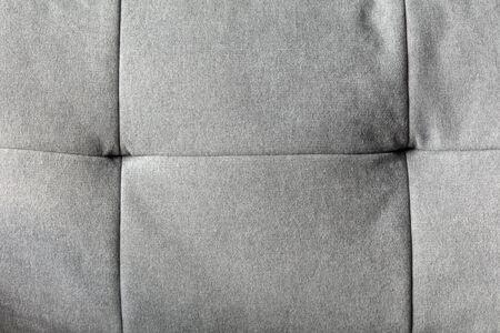 Close up shot of surface of furniture cloth texture for background or devices wallpapers. Abstract design, usual, natural materials. Detailed grungy artwork. Copyspace, advertisement. Vintage style.の写真素材