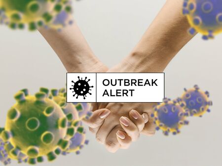 Human hands shaking, avoid greeting while coronavirus epidemic - concept of spreading of virus....