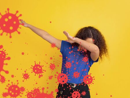 How to sneezing right - caucasian girl dabbing isolated on studio background with viruses illustration. Beautiful female model. Human emotions, sales, healthcare and medicine concept. Stop epidemic.の写真素材