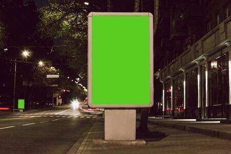 Blank citylight for advertising at the city around, copyspace for your text, image, design. Media marketing, ads, promo announcement, commercial propose or message. Banner, template. Chromakeyの写真素材