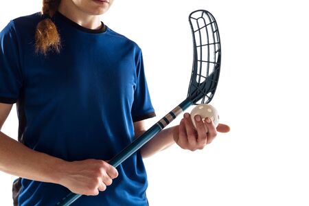 Floorball female player isolated on white studio background. Action and motion, movement, healthy...