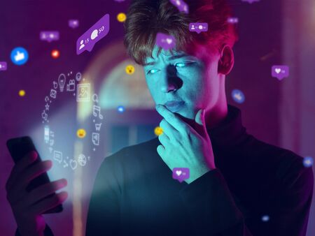 Beautiful man with white eyes using interface modern technology and digital layer effect for social...