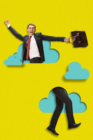 Businessman jumping high. A person flying higher than blue clouds on yellow sky background. Dream, paperworld. Cutout of paper. Contemporary colorful and conceptual art collage with copyspace.の写真素材