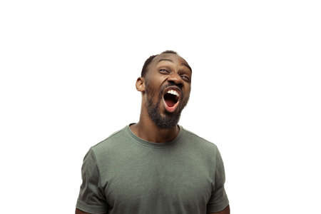 LOL, LMAO. Young african-american man with funny, unusual popular emotions and gestures on white...