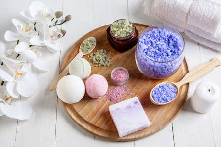 Beautiful spa composition on massage table in wellness center, copyspace. Accessories for relaxing...