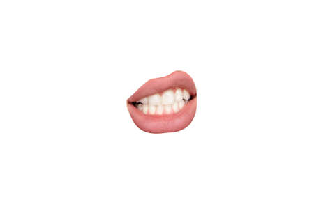 Teeth. Close up view of female mouth wearing nude lipstick over white studio background. Copyspace...