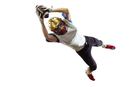 In jump, flight. American football player isolated on white studio background with copyspace....