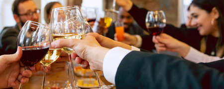 Corporate. Hands of friends, colleagues during beer drinking, having fun, clinking bottles, glasses together. Flyer with copyspace. Oktoberfest, friendship, togetherness, happiness holidays conceptの写真素材