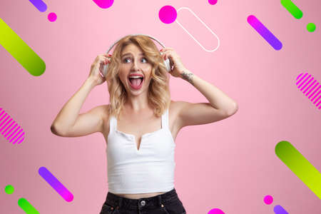 Astonished, wondered. Caucasian womans portrait. Beautiful female model in casual. Concept of human emotions, facial expression, sales, ad, copyspace. Bright, modern illustrated background.の写真素材