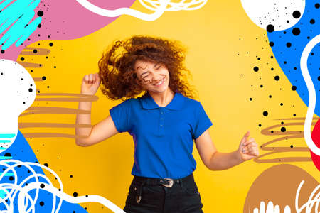 Dancing with hair blowing. Caucasian womans portrait. Beautiful female model in casual. Concept of...