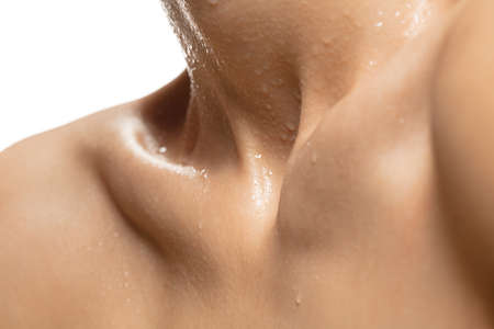 Close-up beautiful jewish womans neck isolated on white studio background. Beauty, fashion,...