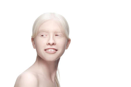 Unique. Portrait of beautiful albino woman isolated on white studio background. Beauty, fashion, skincare, cosmetics concept. Copyspace. Well-kept skin, fresh look. Inclusion and diversity.の写真素材