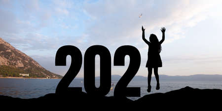 Greeting card decorated for New Year 2021 and Christmas. Landscape scenery with 2021 on sea...