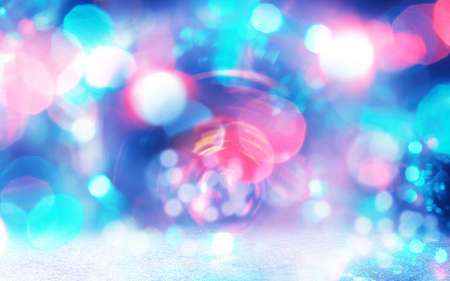 Holiday evening and party lights. Glitter vintage lights background. Defocused bokeh effect....