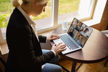 Music concert online, job or education. Close up screen. Workplace anywhere you go with PC, devices and gadgets. Concept of distance learning, isolation, business, shopping online, conference.の写真素材