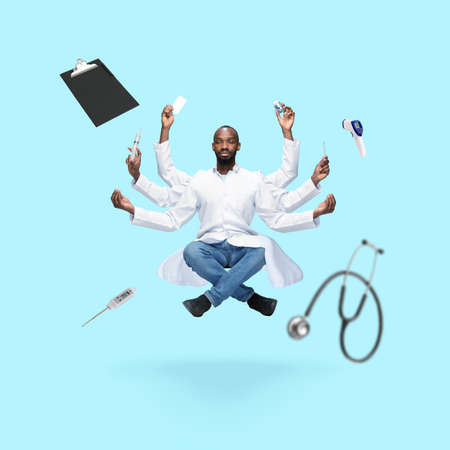 Handsome african doctor, multi-armed man levitating isolated on blue studio background with...