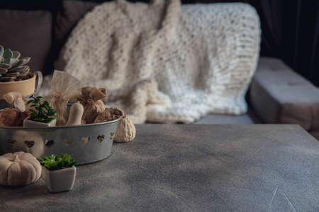 Festive decorations, modern design isolated on grey and white background. Copy Space for ad, design.. The concept of home atmosphere and comfort, holidays, romantic date, winter, autumn, home comfort.の写真素材