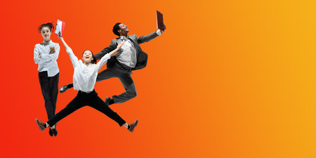 Juice. Happy office workers jumping and dancing in casual clothes or suit isolated on gradient neon fluid background. Business, start-up, working open-space, motion, action concept. Creative collage.の写真素材