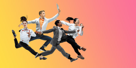 Sunset. Happy office workers jumping and dancing in casual clothes or suit isolated on gradient neon fluid background. Business, start-up, working open-space, motion, action concept. Creative collage.の写真素材