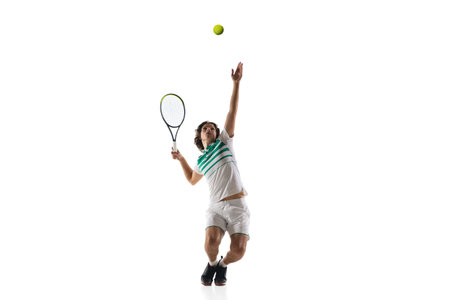 Jump. Young caucasian professional sportsman playing tennis isolated on white background. Training,...