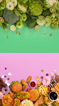 Fast and healthy food compared on pink-green background. Unhealthy set of burgers, sauces, french fries in comparison with set of vegetables, fruits, organic green avocado, cabbage, nuts, citruses.の写真素材