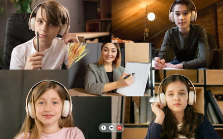 Group of kids, class studying by group video call, use video conference with each other and teacher. PC screen view with application ad. Easy, comfortable usage concept, education, online, childhood.の写真素材