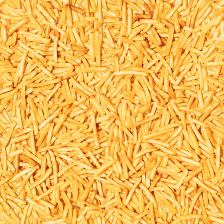 Pattern made from fried potato. Top view, flat design. Fast food.の写真素材