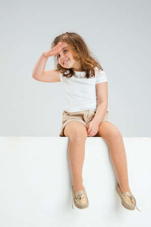 Pretty caucasian girl portrait isolated on white studio background with copyspaceの写真素材