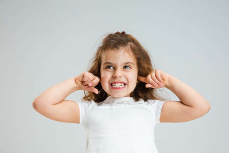 Pretty caucasian girl portrait isolated on white studio background with copyspaceの写真素材