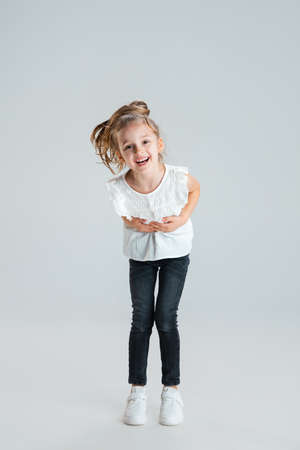 Pretty caucasian girl portrait isolated on white studio background with copyspaceの写真素材