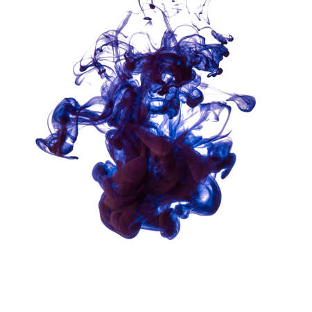 Explosion of colored, fluid and neoned liquids on white studio background with copyspace