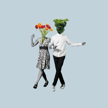 Contemporary art collage, modern design. Retro style. Couple of dancers headed with flowers and plants on blue pastel background.の写真素材